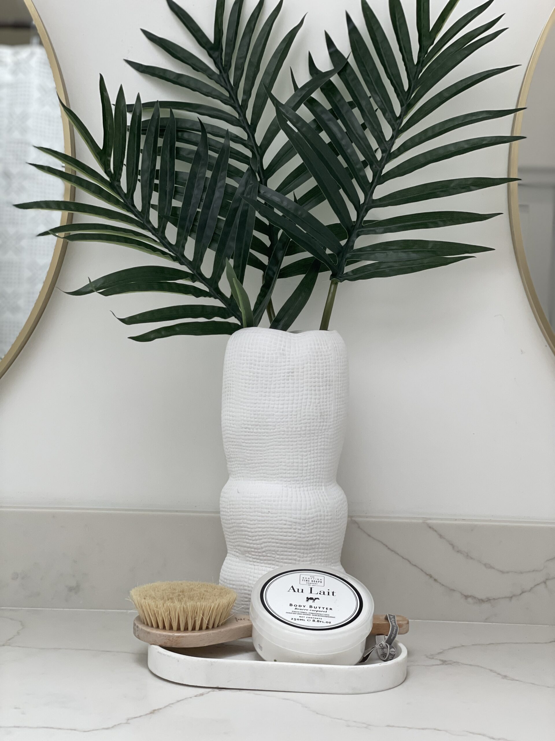 Photo of a professionally staged home showcasing a primary bathroom vanity.