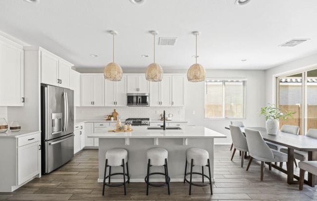 Image of a professionally staged kitchen and casual dining in Gilbert, Arizona by StyleHouse