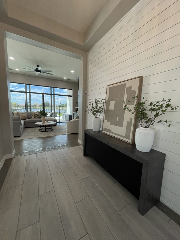 StyleHouse Home Staging & Redesign transforms a Gilbert, AZ entryway into a bright and inviting first impression for homebuyers.