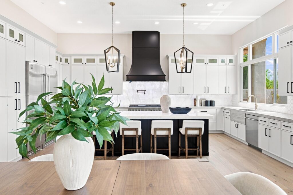 What should you update before buying new furniture? Learn why paint, flooring, wallpaper, millwork, kitchen finishes, and other design decisions should come first.